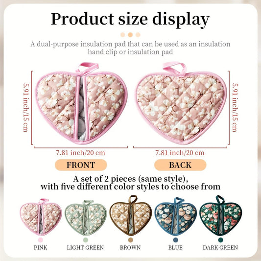 A Set of Two Heart-Shaped Heat-Resistant Pads Measuring 15.01*19.84 cm, Packaged with a Ribbon. These Thick Fabric Mats Feature a Vintage Floral Print And Are Suitable for High Temperatures. They Can Be Hung Up And Used for Handling Hot Pots, Lifting Lid