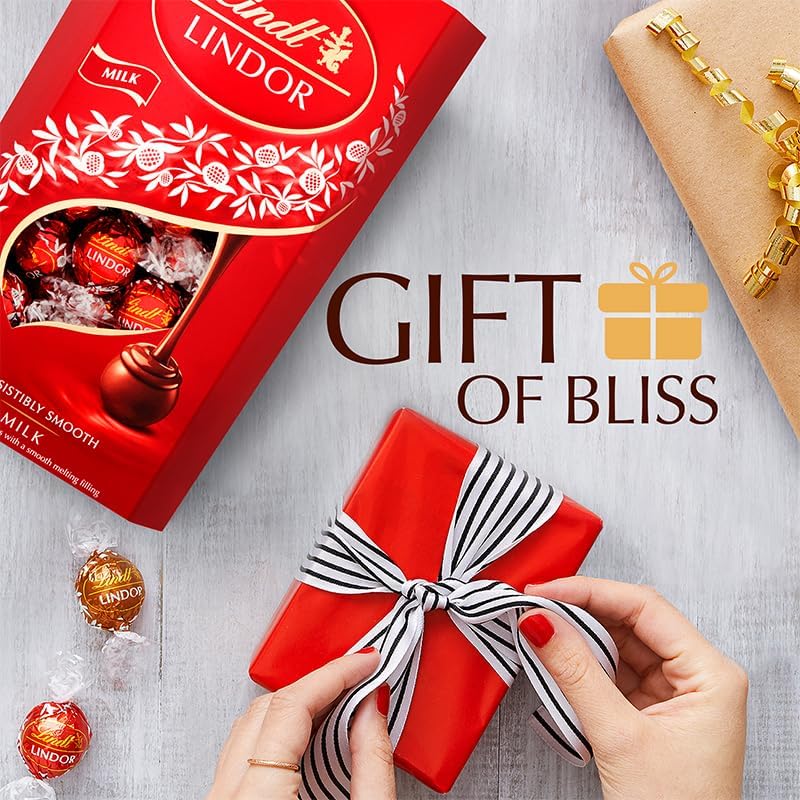 Lindt Lindor Milk Chocolate Truffles Box Extra Large - Approx 48 Balls, 600G - Chocolate Truffles with a Smooth Melting Filling - Gift Present or Sharing Box - Easter, Birthday, Congratulations