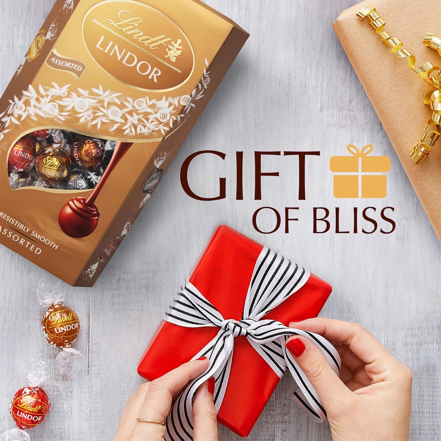 Lindt Lindor Assorted Chocolate Truffles Box Extra Large - Approx 48 Balls, 600G - Chocolate Truffles with a Smooth Melting Filling - Gift Present or Sharing Box - Easter, Birthday, Congrats